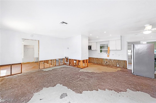 kitchen with ceiling fan, white cabinets, and appliances with stainless steel finishes