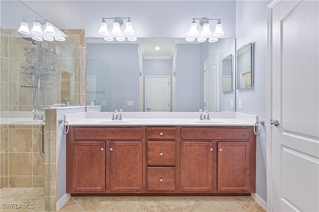 bathroom with tile patterned flooring, vanity, an enclosed shower, and crown molding