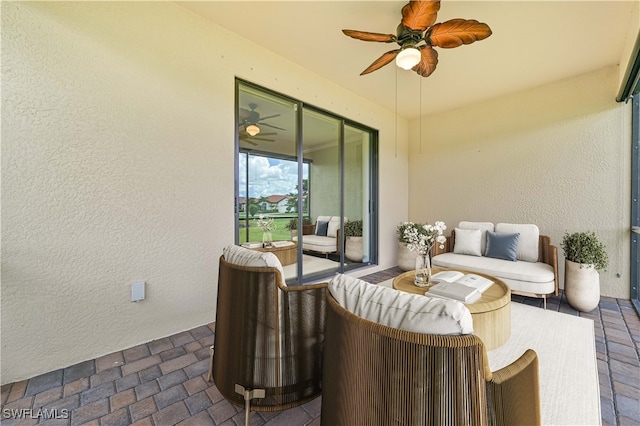 view of patio / terrace featuring ceiling fan