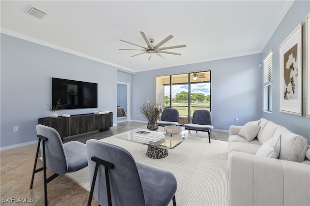 living room with ornamental molding and ceiling fan