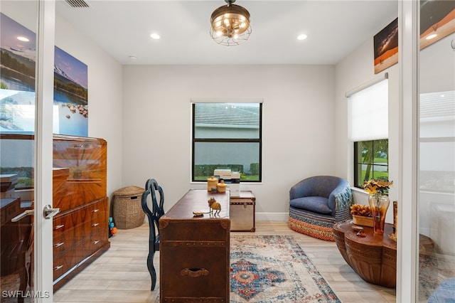 home office featuring light hardwood / wood-style flooring