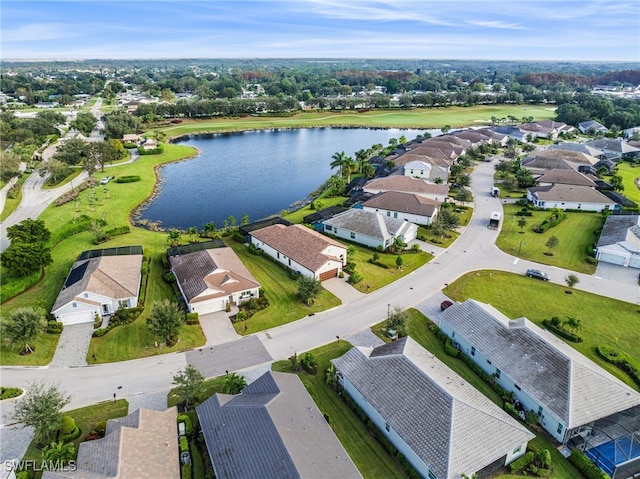 drone / aerial view with a water view