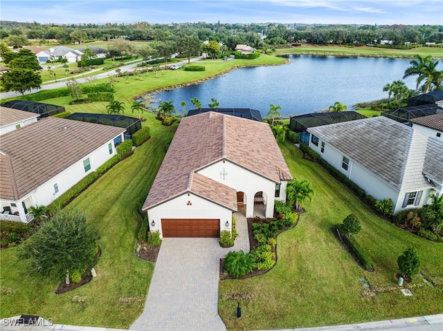 birds eye view of property featuring a water view and a residential view