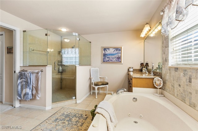 bathroom featuring tile patterned flooring, vanity, and independent shower and bath