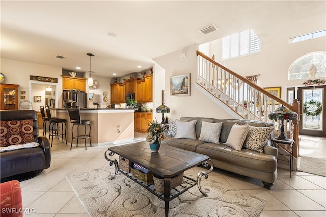 living room with light tile patterned floors