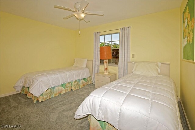 bedroom with light colored carpet and ceiling fan