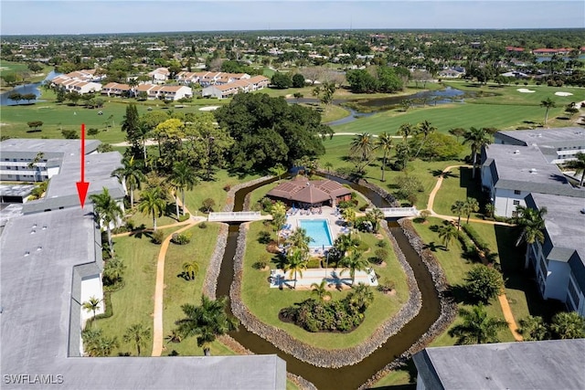 aerial view with view of golf course and a water view