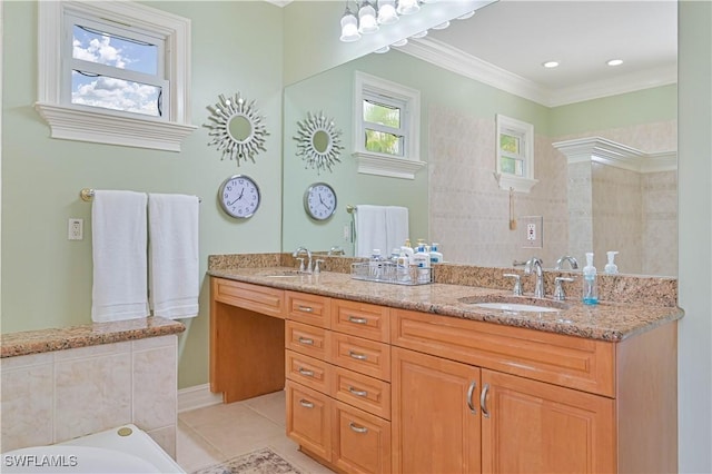 full bath with double vanity, ornamental molding, a sink, and tile patterned floors