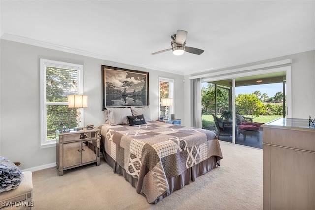 carpeted bedroom featuring ceiling fan, crown molding, and access to exterior