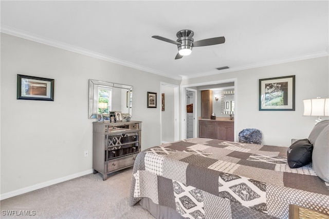 bedroom featuring ensuite bathroom, ceiling fan, crown molding, and light carpet