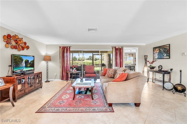 living room with light tile patterned floors and crown molding