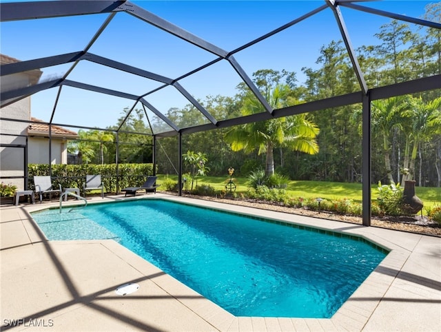 view of pool featuring a patio area and a lanai