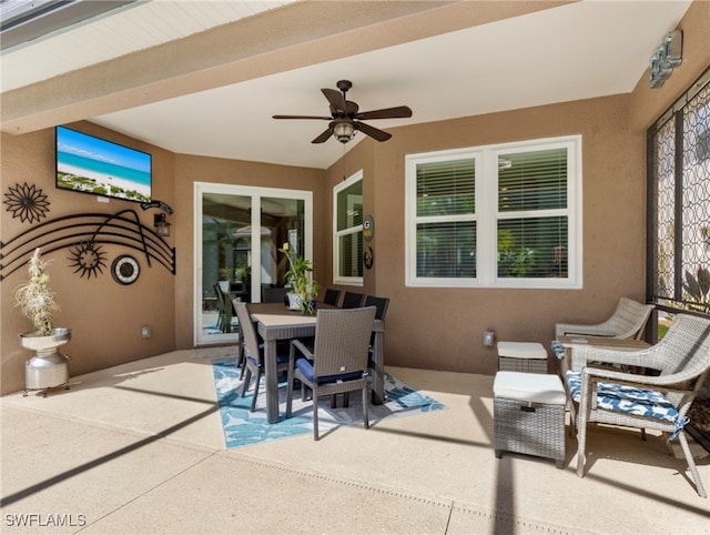 view of patio featuring ceiling fan