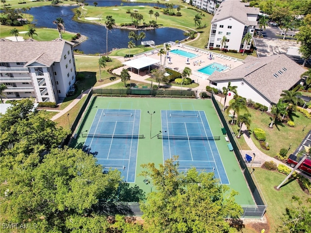 bird's eye view with a water view