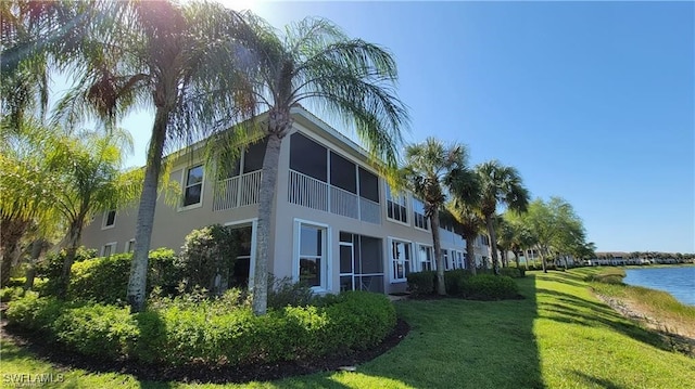 view of property with a water view