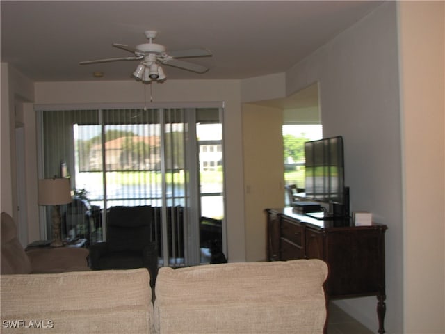 living room with ceiling fan