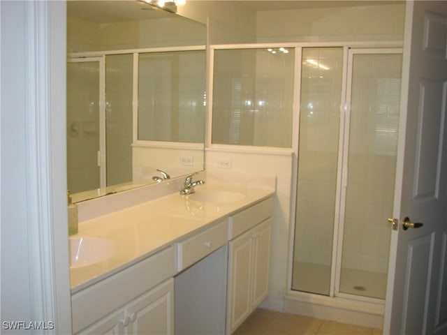 9648 Hemingway Ln Unit 4402, Fort Myers, FL 33913 - bathroom featuring double vanity and a stall shower