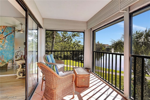 sunroom / solarium with ceiling fan