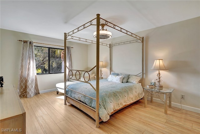 bedroom with light hardwood / wood-style floors