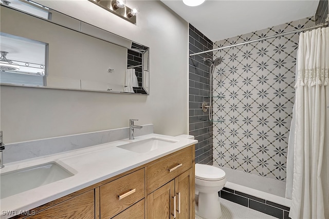 bathroom with tile patterned floors, vanity, toilet, and a shower with shower curtain