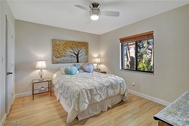 bedroom featuring light wood-type flooring and ceiling fan