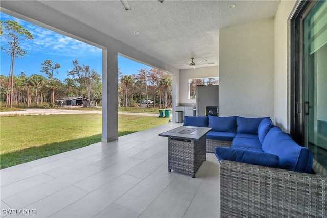 view of patio / terrace with ceiling fan