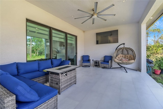 view of patio / terrace with ceiling fan and an outdoor hangout area