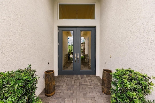 doorway to property featuring french doors