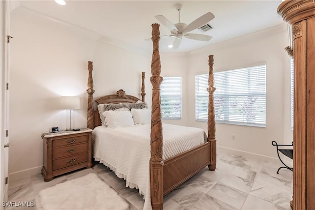 bedroom with ceiling fan and ornamental molding