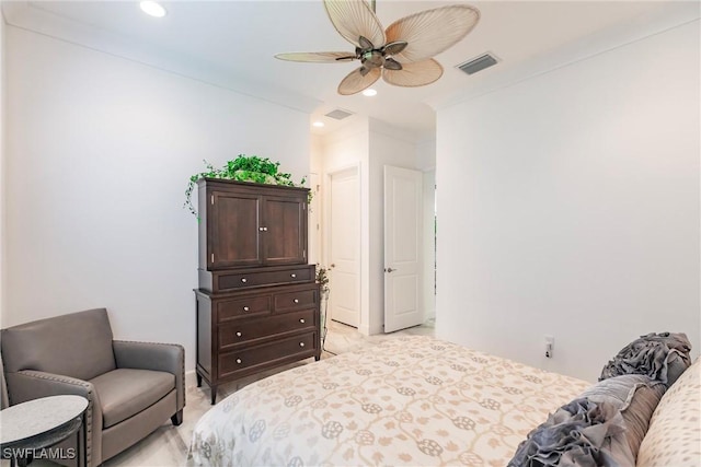 bedroom featuring ceiling fan and ornamental molding