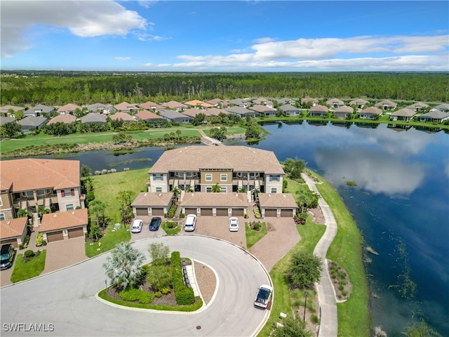 drone / aerial view with a water view