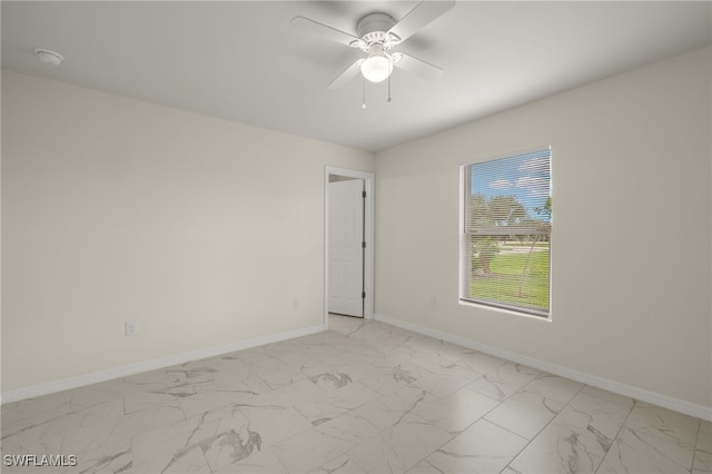 unfurnished room featuring ceiling fan