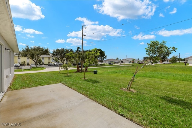 view of yard with a residential view