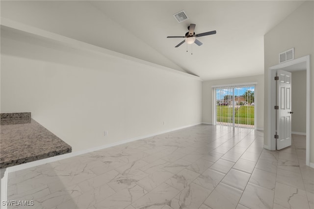 empty room featuring high vaulted ceiling and ceiling fan