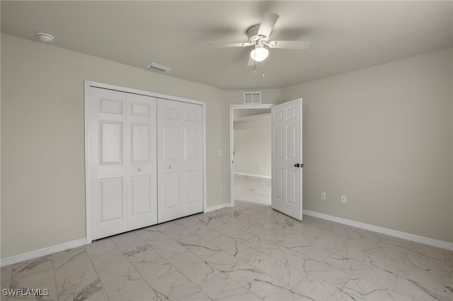 unfurnished bedroom featuring a closet and ceiling fan