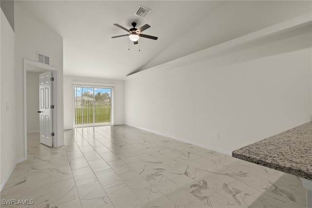 empty room featuring high vaulted ceiling and ceiling fan