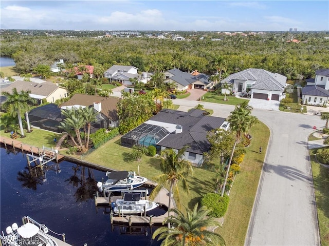 drone / aerial view with a water view