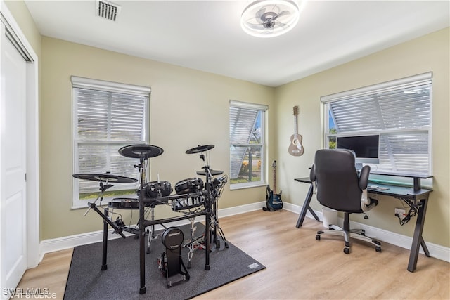 office area with light hardwood / wood-style flooring