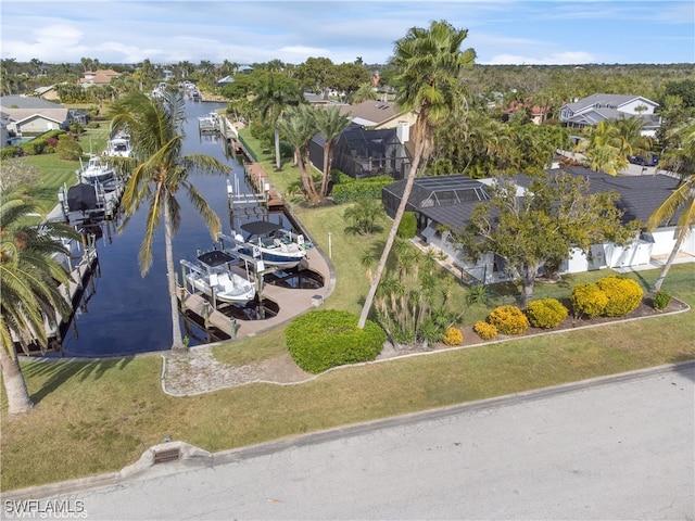 birds eye view of property featuring a water view