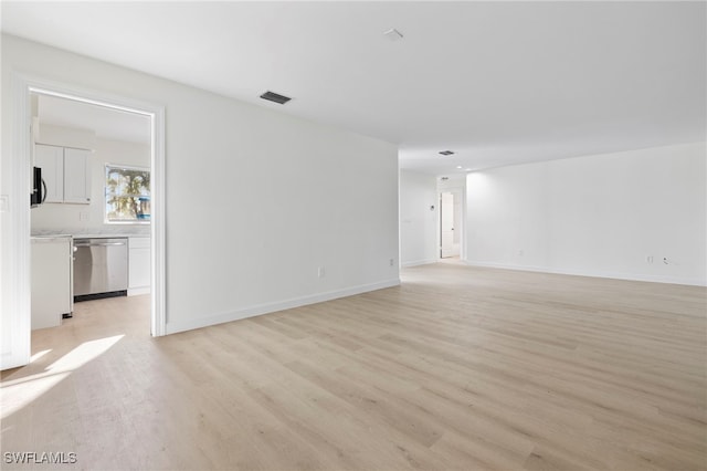 empty room featuring light hardwood / wood-style floors