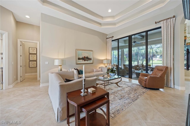 tiled living room with a towering ceiling