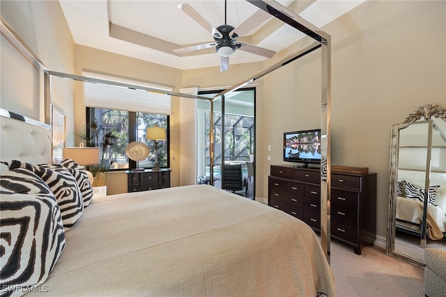 bedroom featuring ceiling fan, access to exterior, and carpet flooring