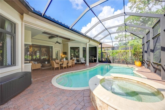 7721 Classics Dr, Naples, FL 34113 - view of swimming pool featuring an outdoor hangout area, a lanai, a ceiling fan, a pool with connected hot tub, and a patio area