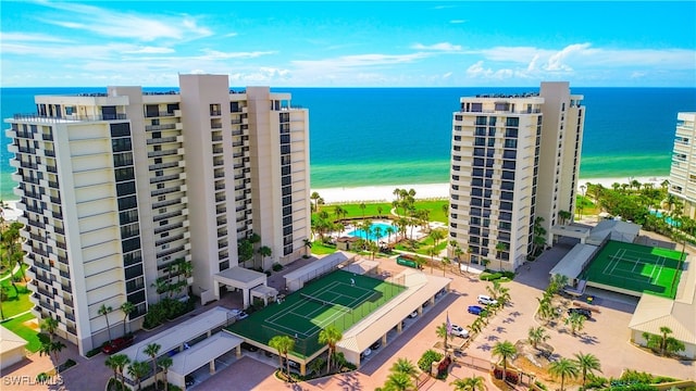 drone / aerial view with a view of the beach and a water view