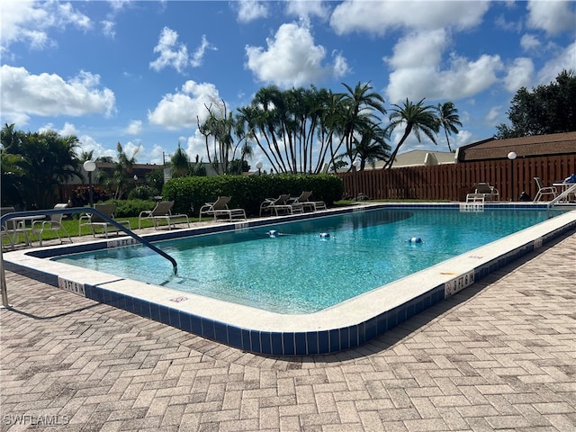 view of pool featuring a patio area