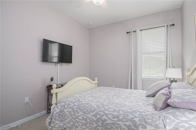 bedroom featuring ceiling fan and light colored carpet