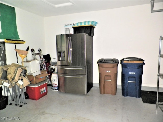 interior space featuring stainless steel refrigerator with ice dispenser