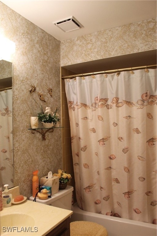 bathroom featuring vanity and shower / tub combo with curtain