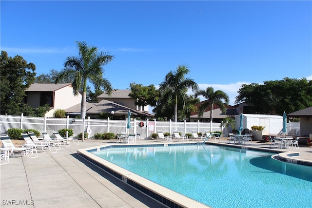 view of swimming pool with a patio area