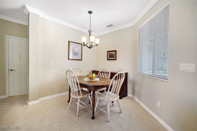 dining area with crown molding, light tile patterned floors, and a chandelier